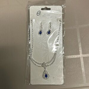 NEW IN PACKAGE Prom/evening wear jewelry (looks like blue sapphire/diamond)
